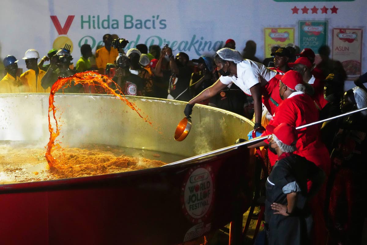 Chef Hilda Baci attempts to cook the world’s largest pot of jollof rice in Lagos, Nigeria, on Friday.