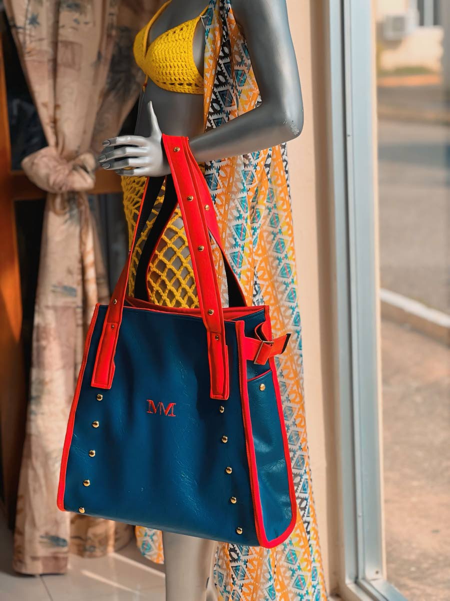 Whether it’s the beach or a pool flex, be bold in colour with this barrel tote by your side.