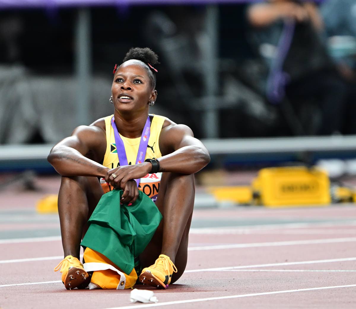 Jamaica’s Shericka Jackson sits on the track shortly after placing third in the women’s 200 metres final on day seven of the 2025 World Athletics Championships.