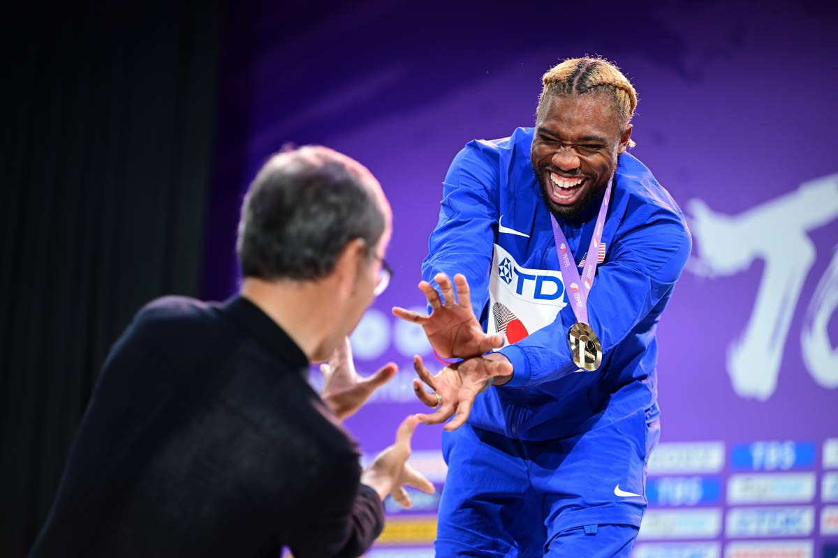 Men’s 200 metres gold medallist  Noah Lyles of the United States does his signature gesture, the Dragon Ball-inspired kamehameha wave, at the medal ceremony held on day eight of the 2025 World Athletics Championships in Tokyo, Japan.