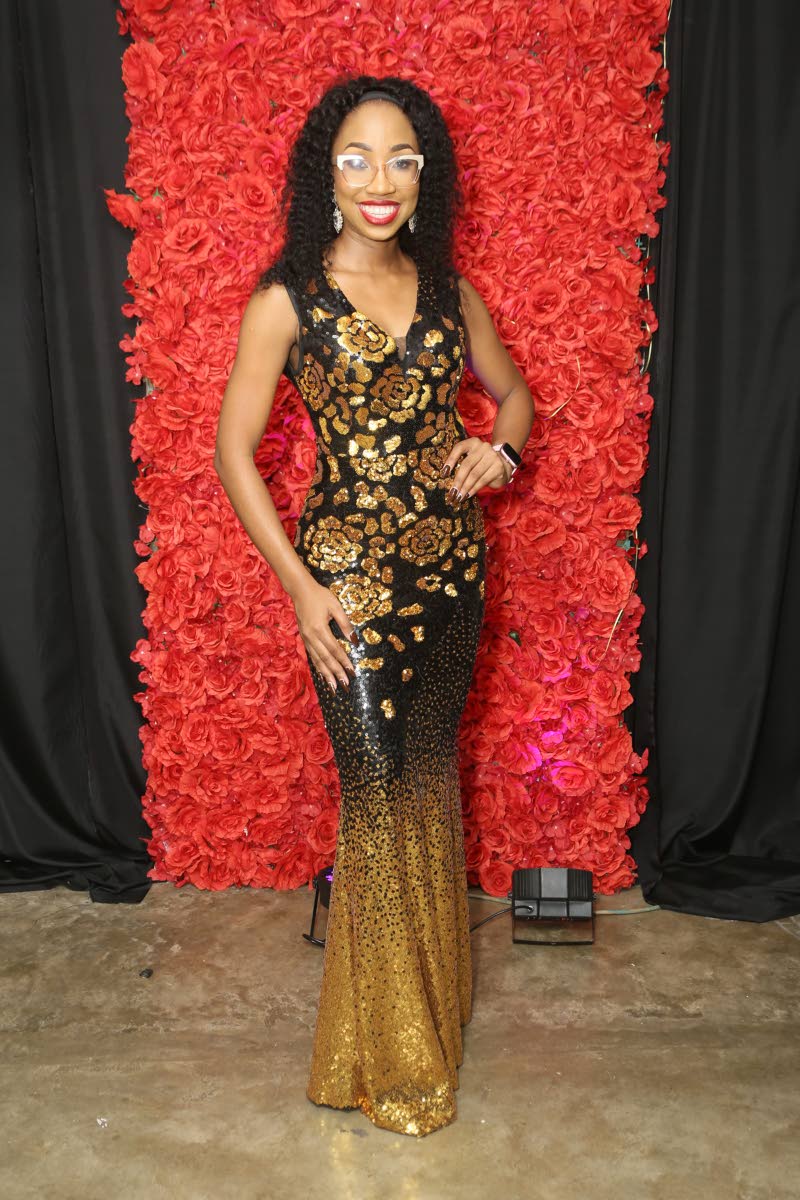 Brithney Clarke, regional manager, Miss Jamaica World Eastern, is stunning in a black-and-gold number she picked up from Mini’s Fashion in York Plaza. 