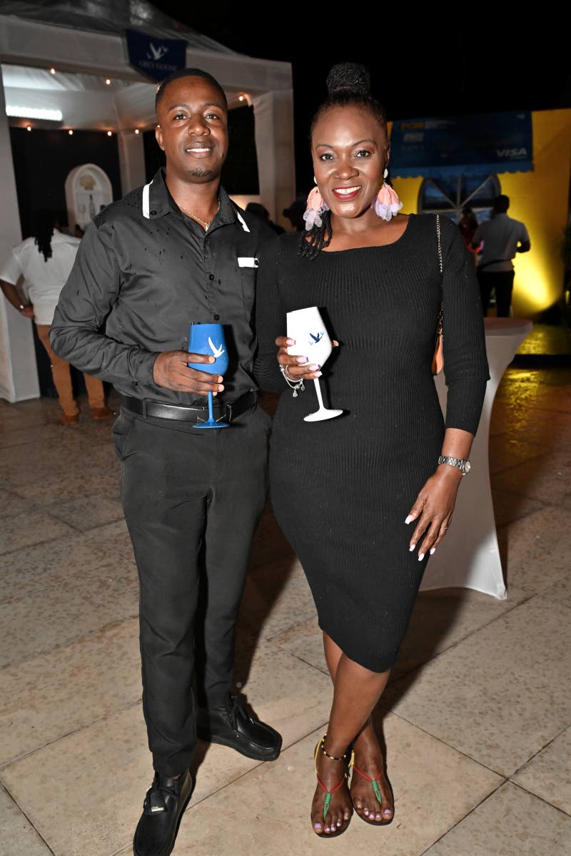 Jemar Pownall, sales executive, and Neikesha Kazer, sales manager, both of Glastonbury Purveyor Company, pause to capture the moment.