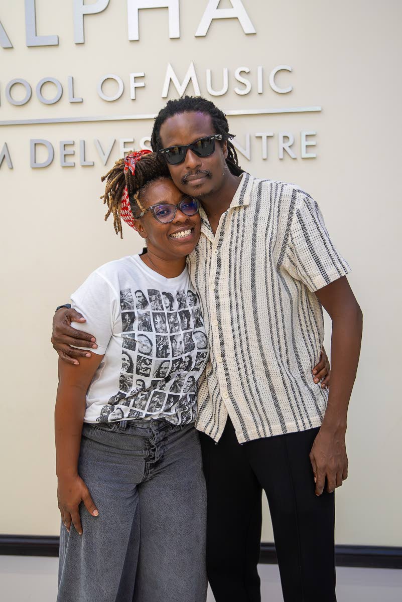 Stephanie Marley shares a moment with director Garreth M. Daley at the private screening of the documentary ‘Journey’ at the Jackie Willacey Hall at the Alpha School of Music last Tuesday. 