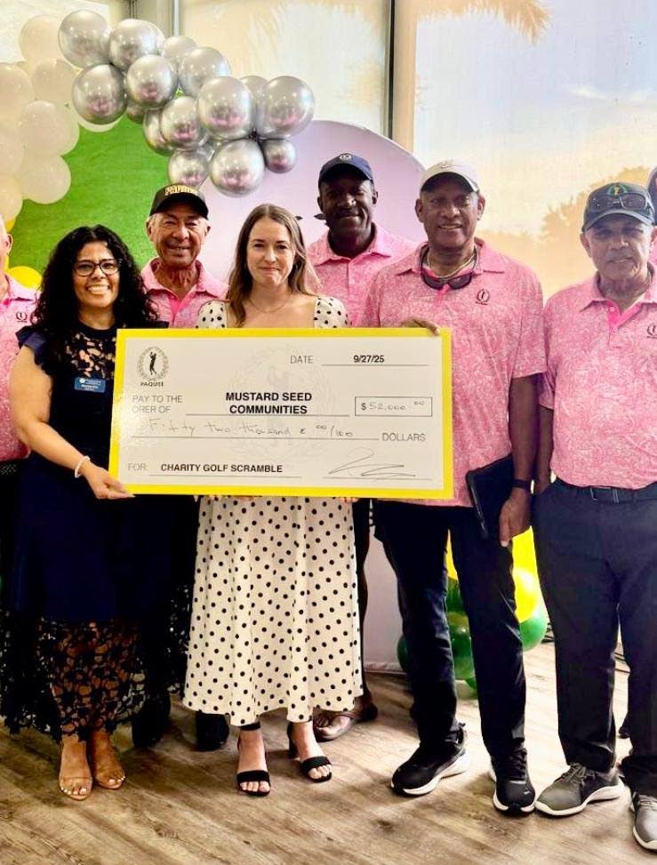  The Miami-based Paquee Golf Club has raised J$10.5 million for Mustard Seed Communities in Jamaica towards the caring of the disabled and abandoned children and adults. From left are representatives of Mustard Seed Communities and members of the Paquee Go