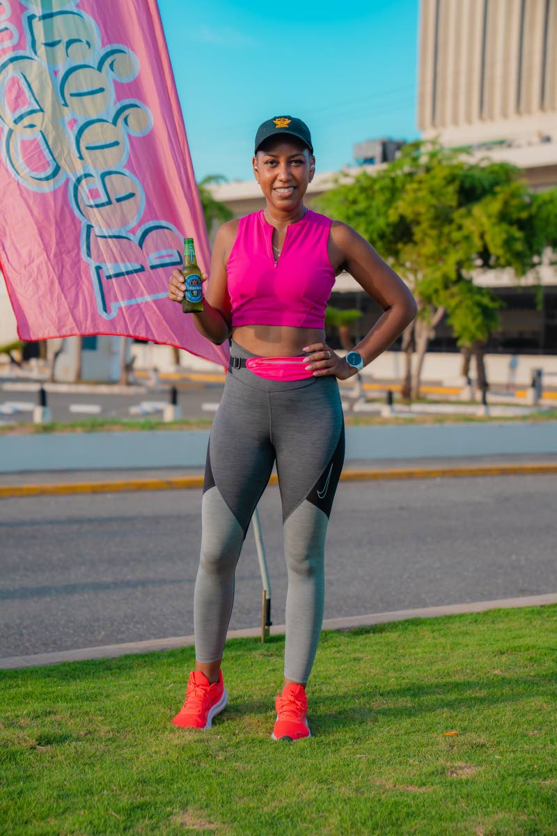 With determination guiding her, Kalilah Reynolds, founder of Money Media, finishes her run with calm confidence.