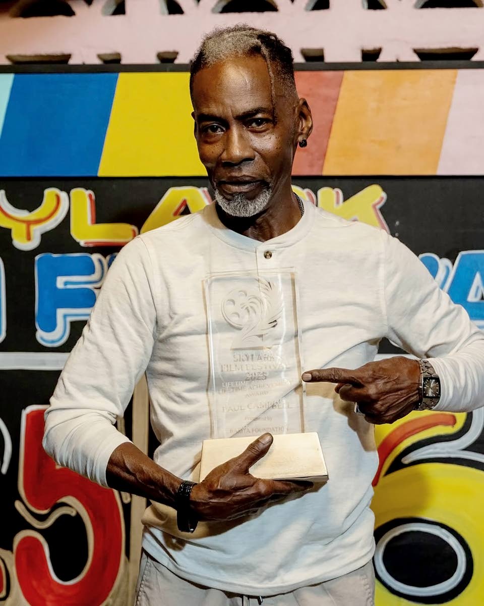Veteran actor Paul Campbell poses for the camera after receiving the first-ever Skylark Film Festival Lifetime Achievement Award on Friday.
