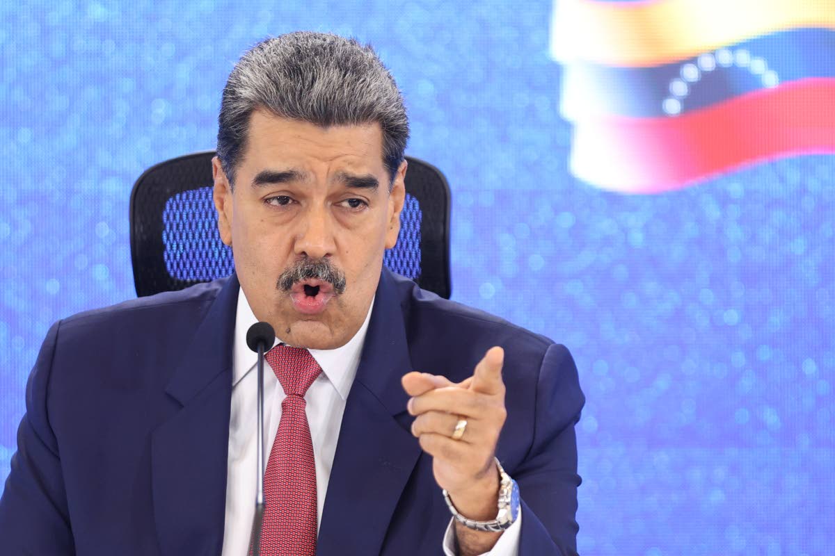 Venezuelan President Nicolas Maduro gives a press conference in Caracas, Venezuela, Monday, Sept 15, 2025. (AP Photo/Jesus Vargas)