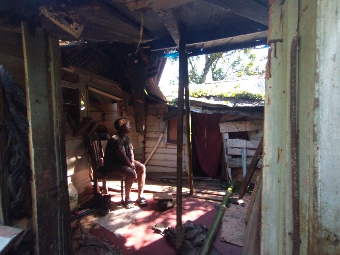 Delmina Pusey ponders the fate that has befallen her and her common-law husband Rudy Campbell in Castleton, St Mary, after a guinep tree fell on their home during a freak storm, causing significant damage, just over a week ago.