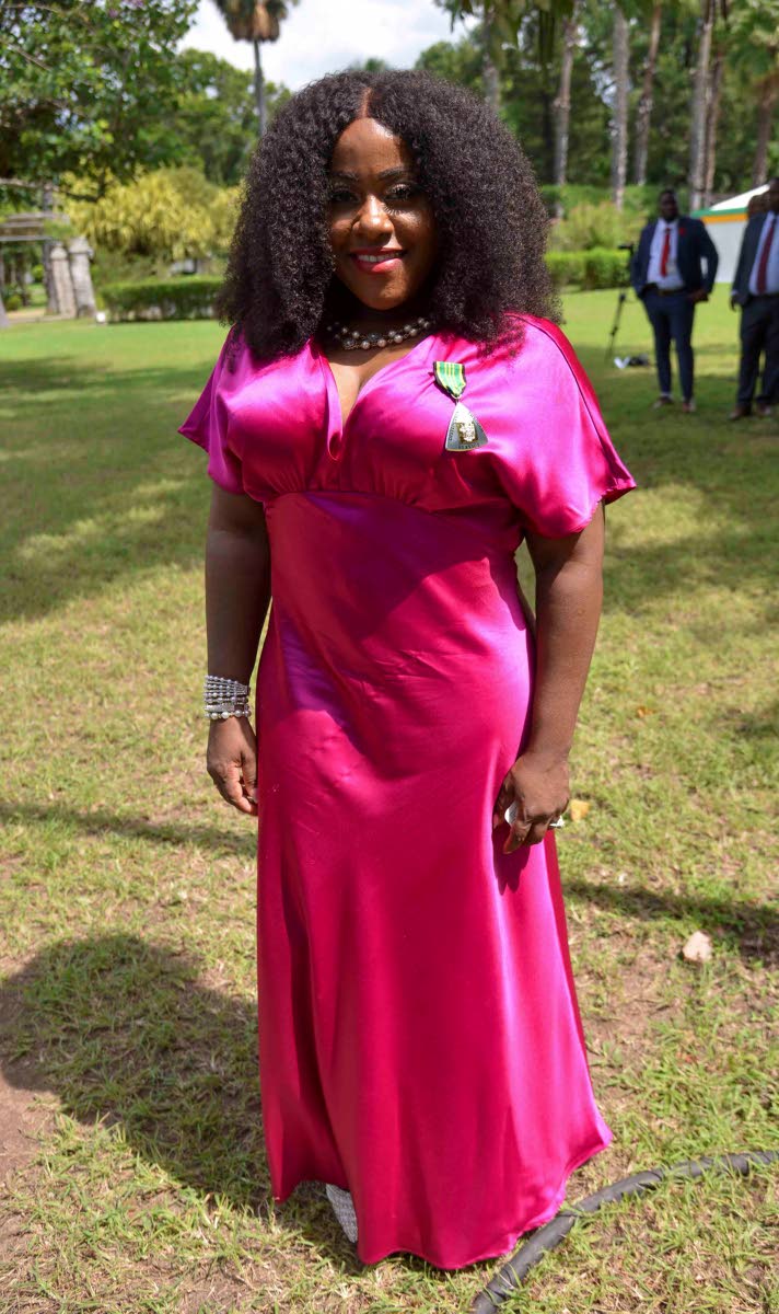 To make the moment more memorable and meaningful, Etana accepted her Order of Distinction at King’s House in a dress made by her aunt.
