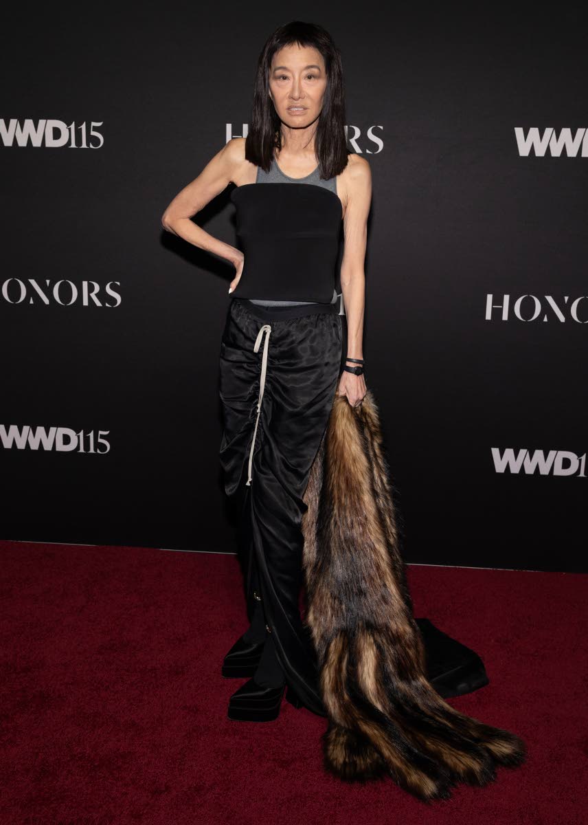 Vera Wang gives athleisure a formal spin, pairing it with platform heels and a stole. 