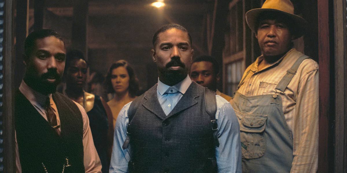 From left: Michael B. Jordan, Michael B. Jordan and Omar Benson Miller in a scene from ‘Sinners’.