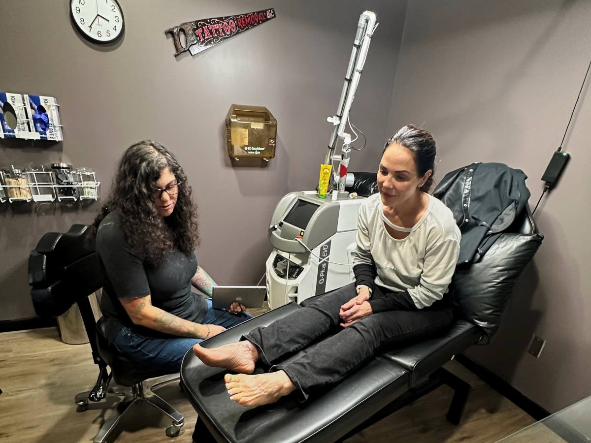 
Tracy Herrmann says the four tattoos getting lasered are part of her past and that’s where she wants them to stay.