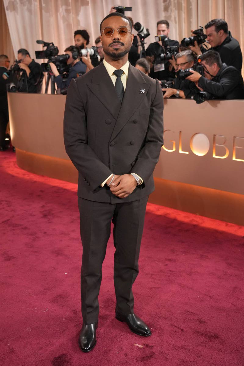 Michael B. Jordan polishes his look in Prada with Doucal’s shoes.