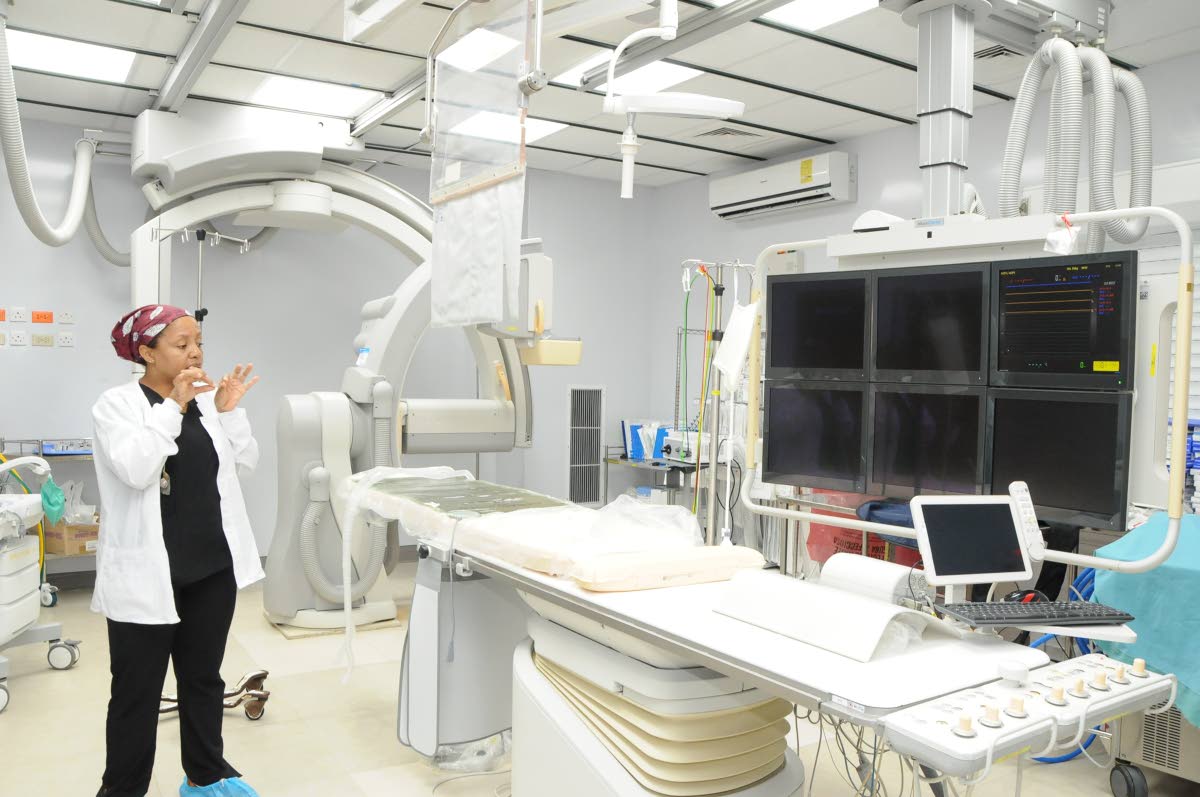 Dr Cleopatra Patterson, paediatric cardiac anaesthetist and intensivist at the Bustamante Hospital for Children, showcases a procedure room, designed for minimally invasive, cardiac procedures during a tour of the facility by a 16-member volunteer team led