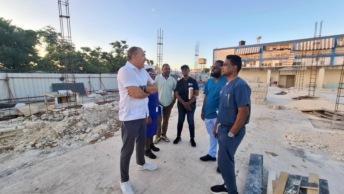 Minister of Health and Wellness Dr Christopher Tufton speaks with (from left) Matron Hazeline Forrester; Little London Councillor Ian Myles; Novlin Leslie-Little, parish manager at the Westmoreland for Public Health Services; Head of the Accident and Emerg