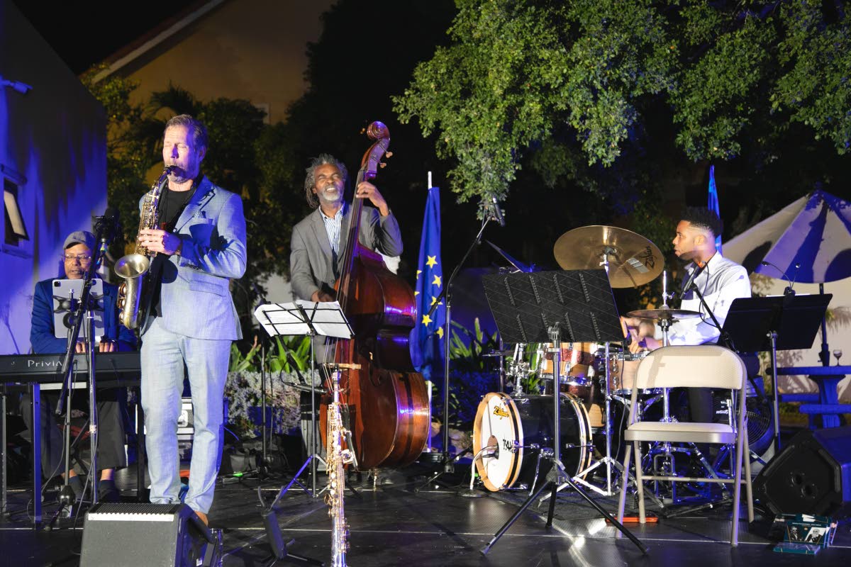 European saxophonist Pekka Pylkkänen (left) and Leon ‘Mandela’ Duncan (centre) and Clayon Samuels of the Orville Hammond Trio, in action on January 23. 