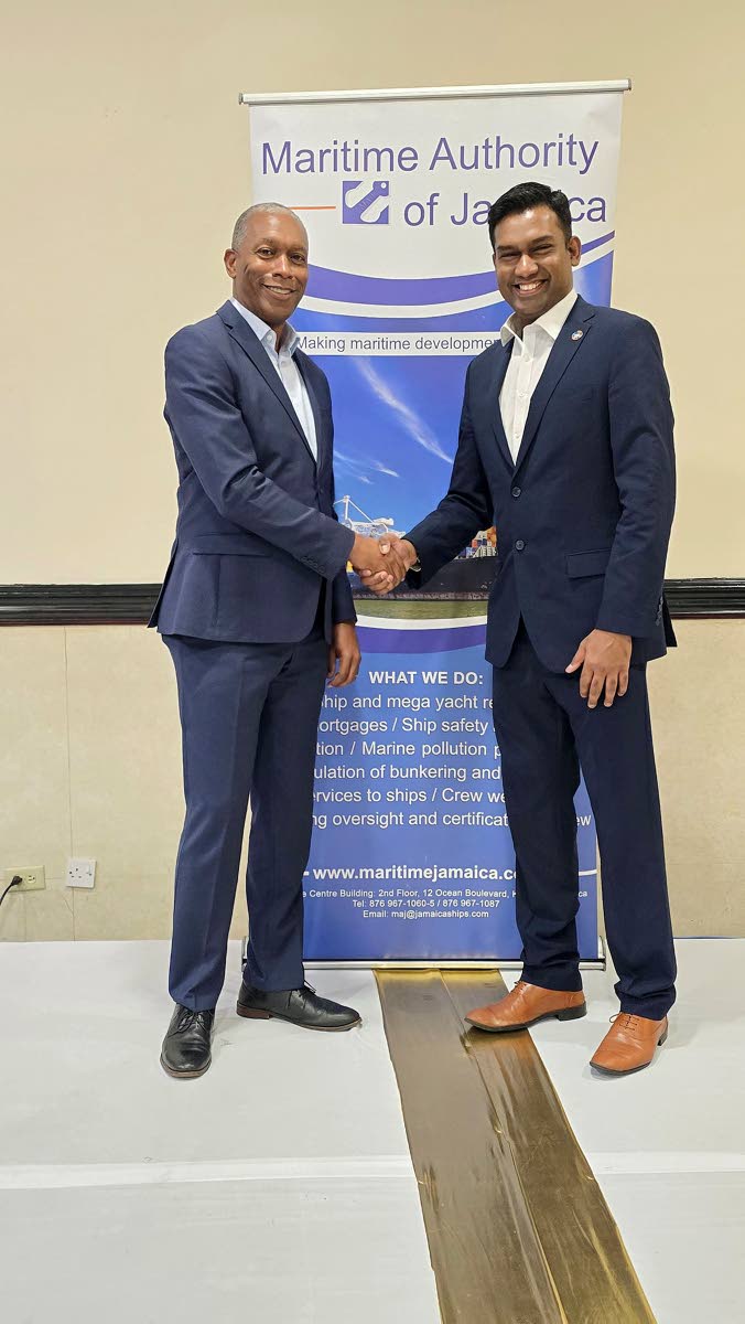 Bertrand Smith, director general, Maritime Authority of Jamaica (left) with Subaskar Sitsabeshan, project officer of the Green Voyage 2025 initiative of the International Maritime Organization’s Technical Cooperation and Implementation Division.