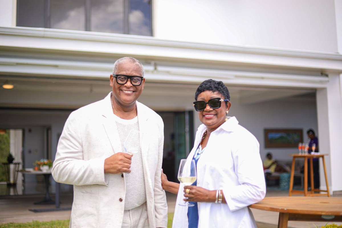 Brian Sang, general manager of The Jamaica Pegasus, pairs up with Minna Israel, special advisor to the vice chancellor on resource development at UWI, Mona, for a quick snapshot.