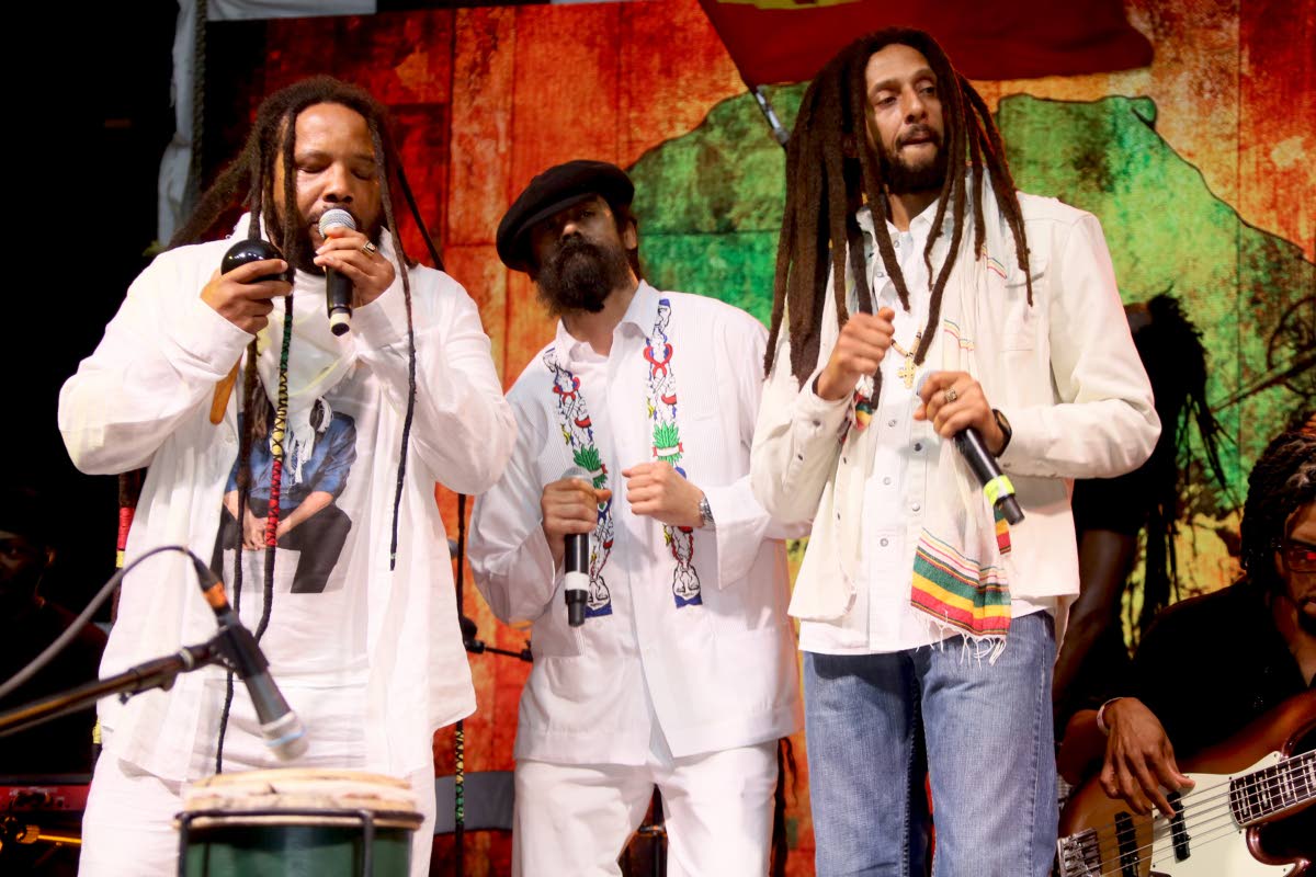 Brothers (from left) Stephen, Damian and Julian Marley perform on stage during the tribute concert for Joseph ‘Jo Mersa’ Marley.