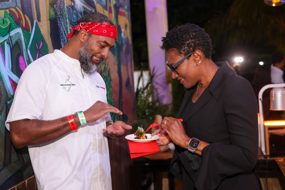Audrey Tugwell Henry, president and CEO, Scotia Group Jamaica, speaks with Chef Scotley Innis on his bold Kuyah menu.