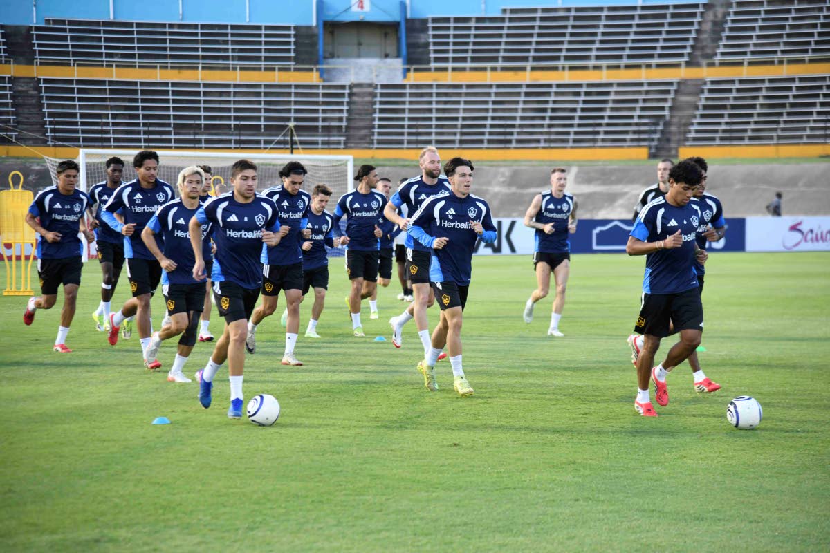 LA Galaxy players going through a training session at the National Stadium yesterday.