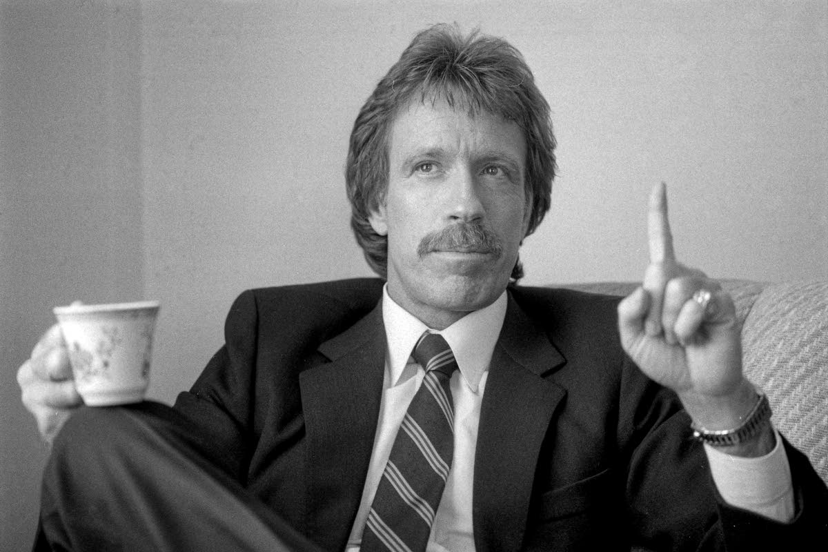 Chuck Norris, actor, mixed-martial arts champion and Air Force veteran, speaks during a promotional tour of ‘The Delta Force’ movie in San Francisco on February 4, 1986. 