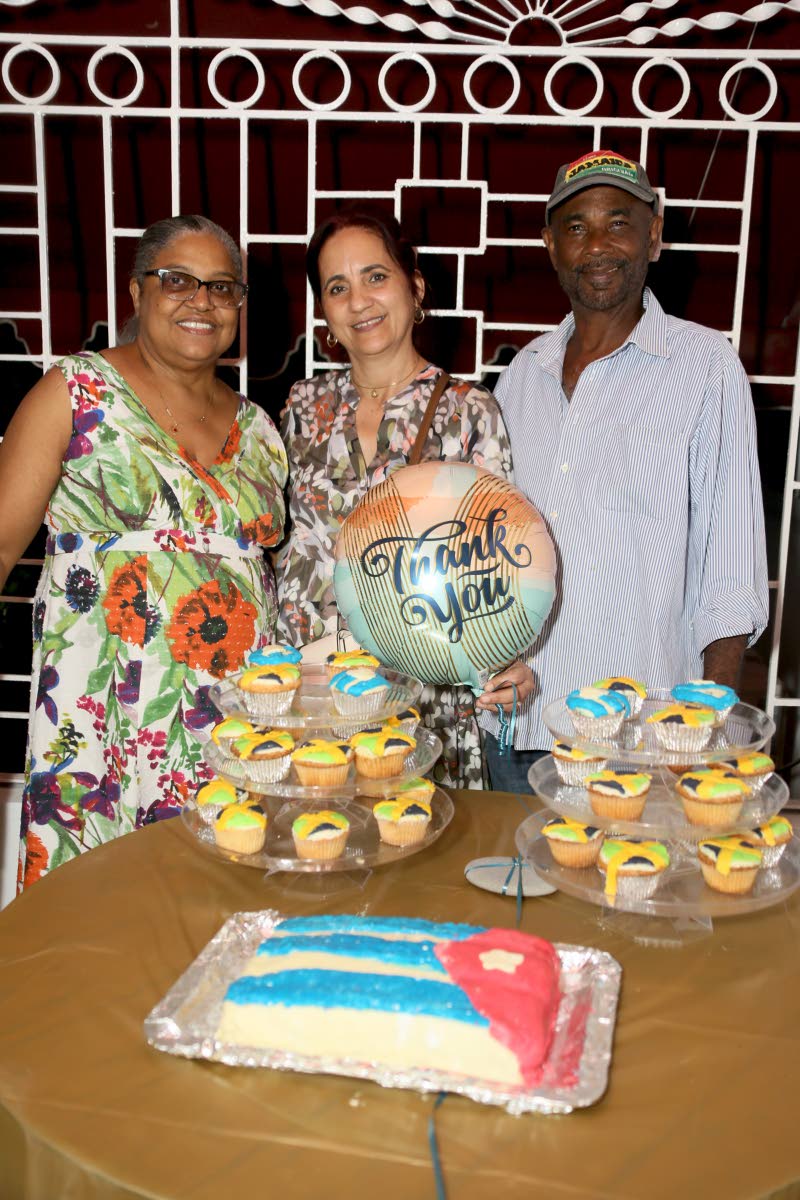 Osmond Brown and his wife, Karen (left) share a light moment with Yamira Delgado, surgical nurse with the Cuban Eye Care Programme at St Joseph’s Hospital, during the farewell party.