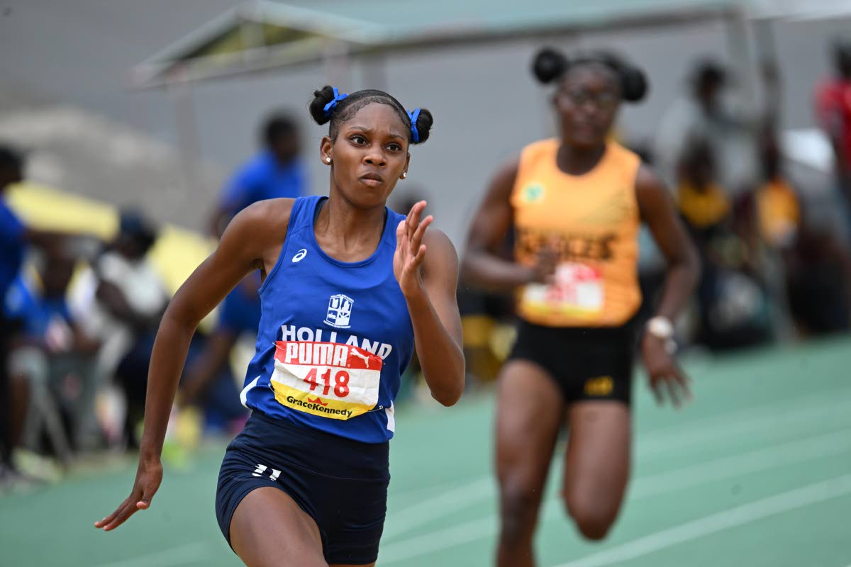 Shanoya Douglas powers around the bend on her way to winning the girls’ Class One 200m in a new championship record time at the at the 2026 ISSA/GraceKennedy Boys and Girls’ Athletics Championships. (Ricardo Makyn photo)