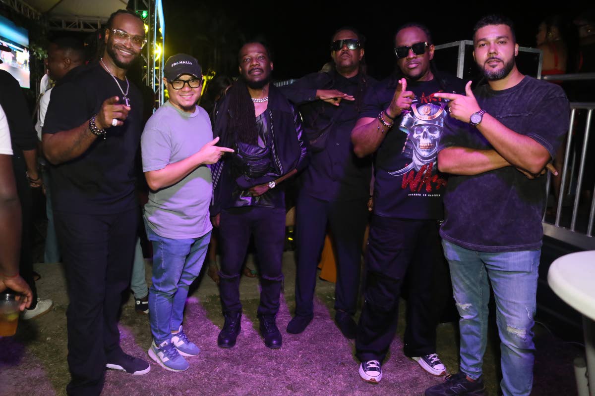 Members of T.O.K. and the co-founders of Fri-Nally came together for a snap. They are (from left): Craig ‘Craigy T’ Thompson; Daniel Wong, co-founder of Fri-Nally; Xavier ‘Flexx’ Davidson; Roshaun ‘Bay-C’ Clarke; Alistaire ‘Alex’ McCalla; a