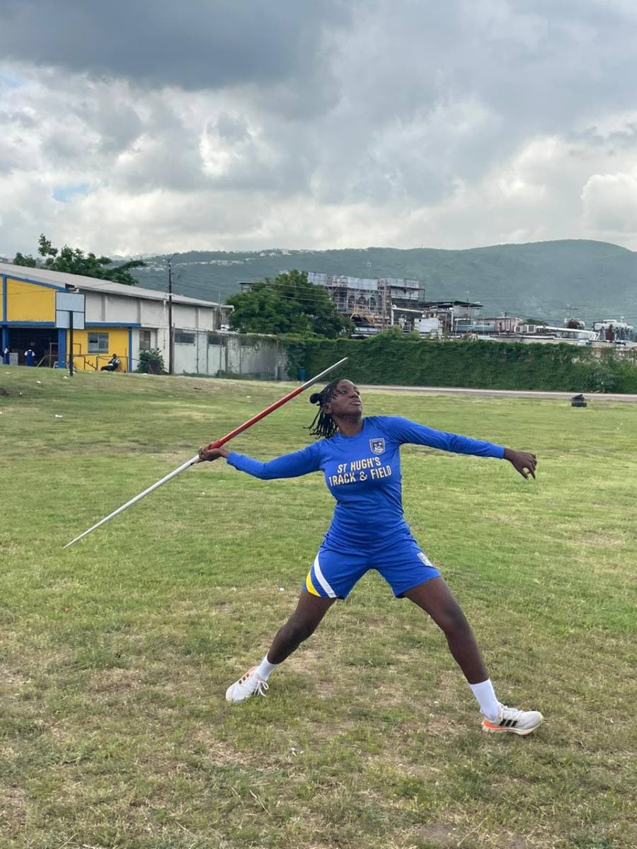 Brianna Carr gets ready to throw the javelin during a training session at St Hugh's High School.