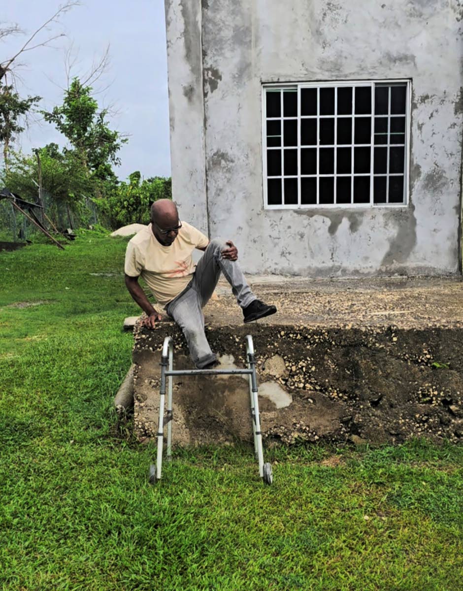 Edgar Bruce makes his way out the church, climbing down a ledge.