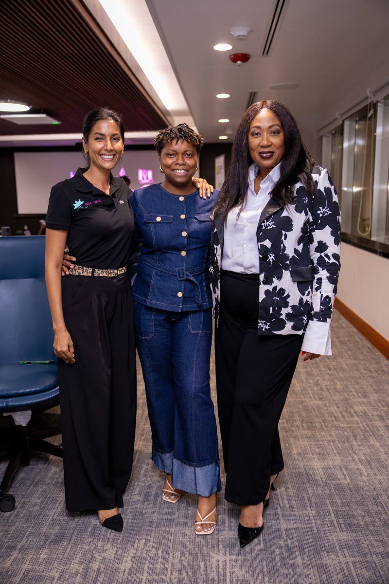 Donning denim-on-denim, Zuribelle Designs’ Latoya Lawrence is flanked by Emma Subratie, managing director, HEMA Luxe Ltd, and brand specialist Norma Williams.