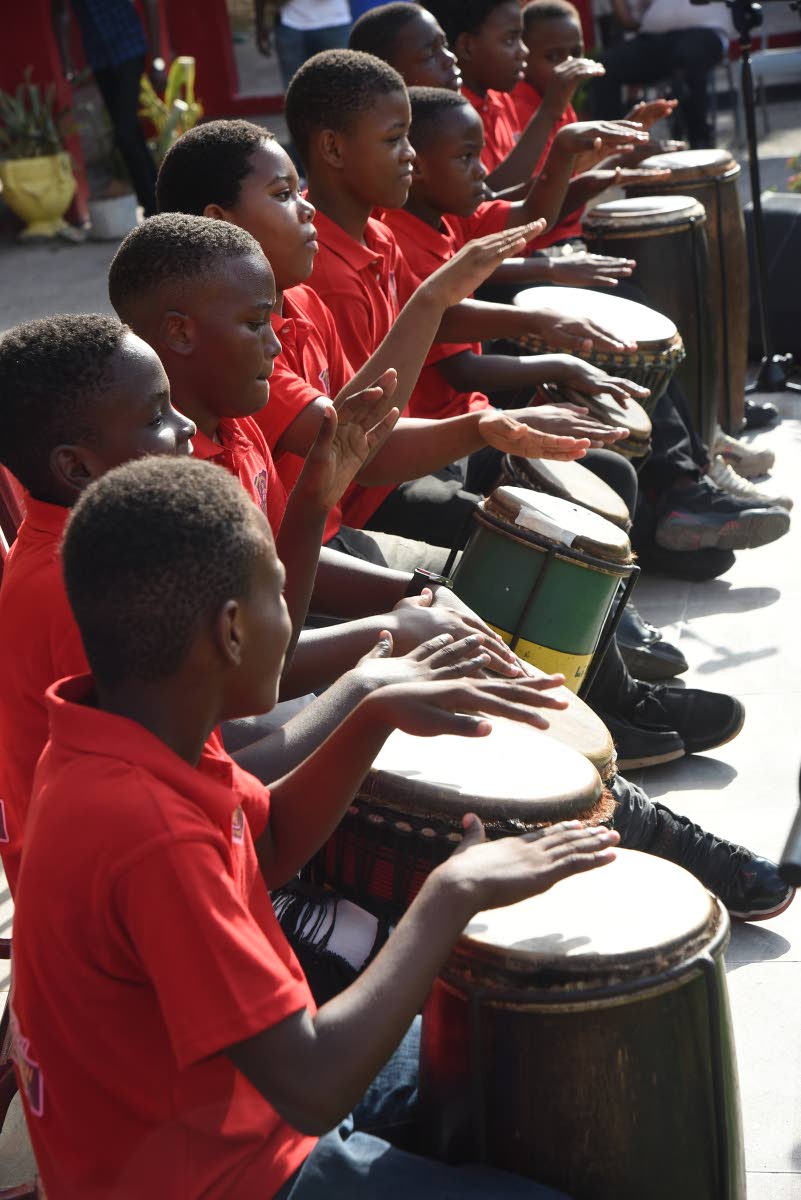 Members of the Seaview Gardens Primary School Ensemble perform during the ceremony at the school marking the presentation of the Key to the City of Kingston to Rodney ‘Bounty Killer’ Price by the Mayor of Kingston Andrew Swaby, and the renaming of Wenc