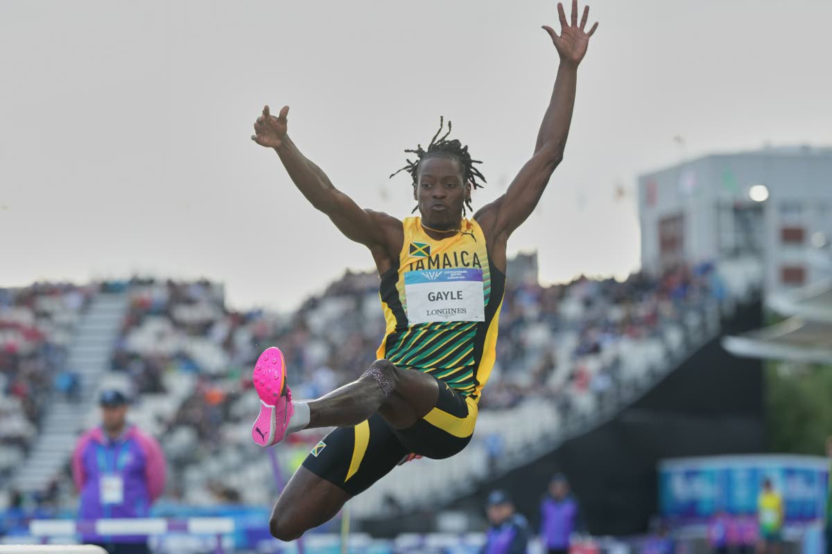 Jamaica’s Tajay Gayle competes in the men’s long jump final at the Commonwealth Games in Glasgow, Scotland, yesterday.