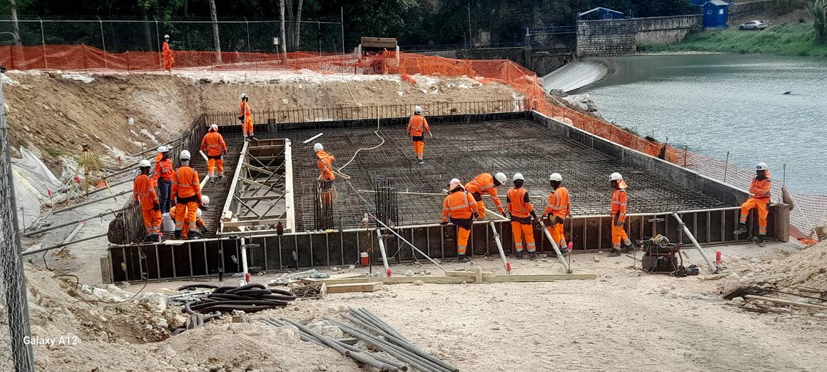 Workers at the Rio Cobre Water Treatment Plant during a site tour on Wednesday.