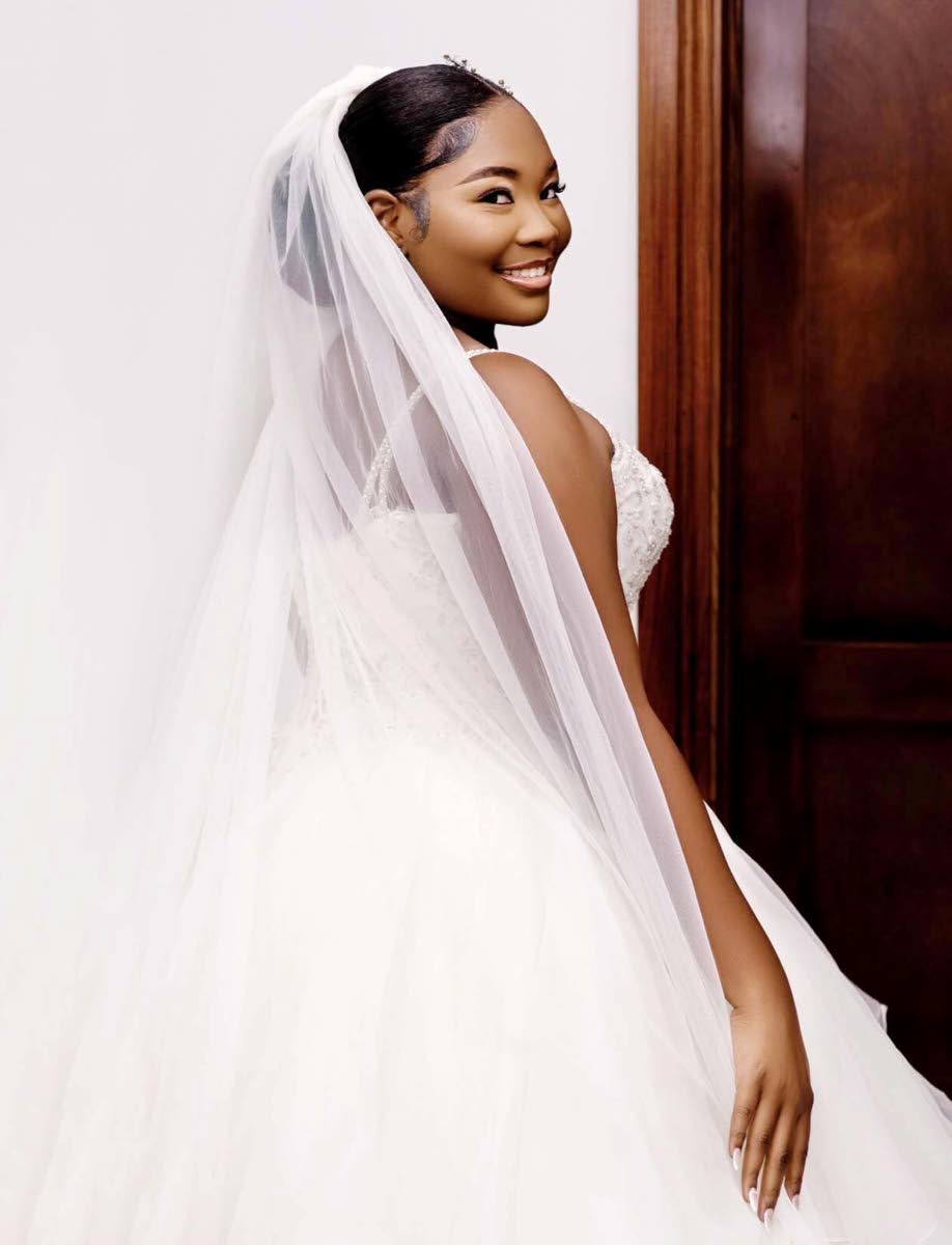 Paige-Marie always dreamt of getting married in a grand ballgown. And she made her dream come true with this gorgeous fit-and-flare selection from Brides of Jamaica.