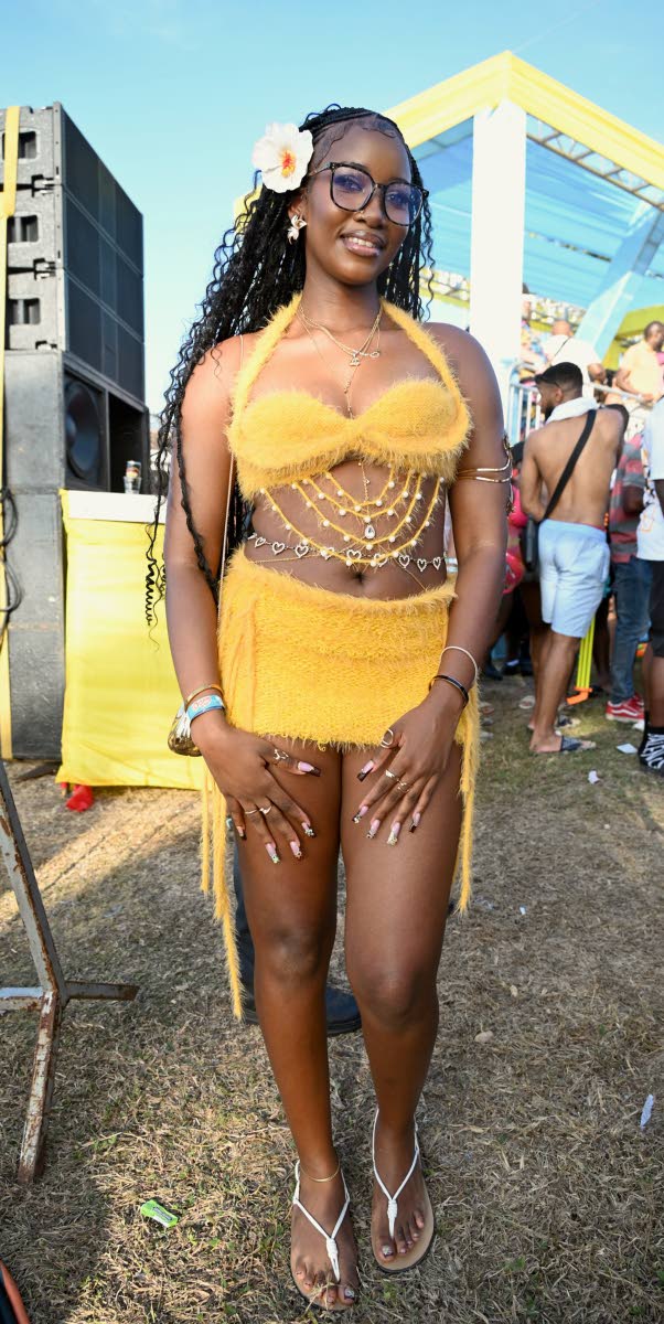 Michaela Stewart was mellow in a yellow halter bralette and mini skirt set at Dream Weekend Wet n’ Wild at The Palms at Rose Hall on Sunday.