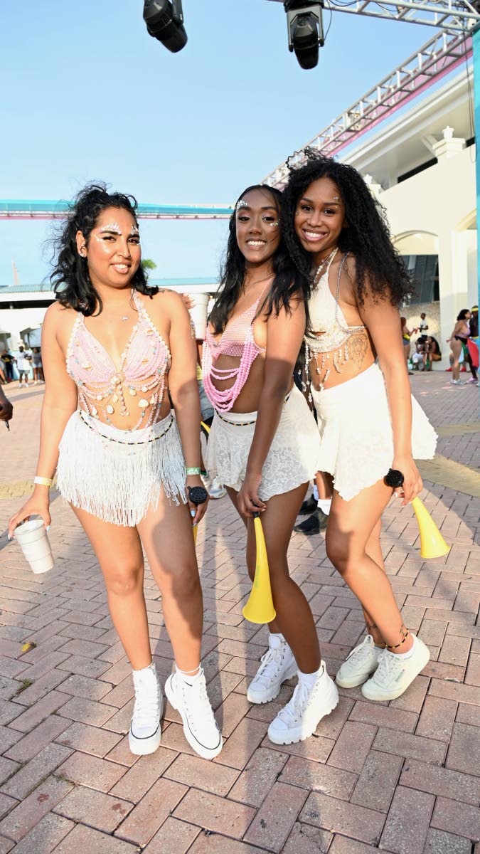 In from Miami, (from left) Ramona Ramlackhan, Diana Randhir and Briana Williams coordinated their outfits for the occasion.