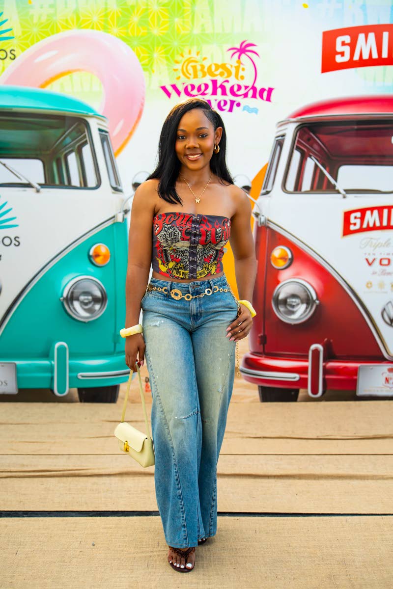 Senior Finance Officer Shanoy Moorhouse revisits the Y2K playbook with a graphic corset top and wide-leg denim.