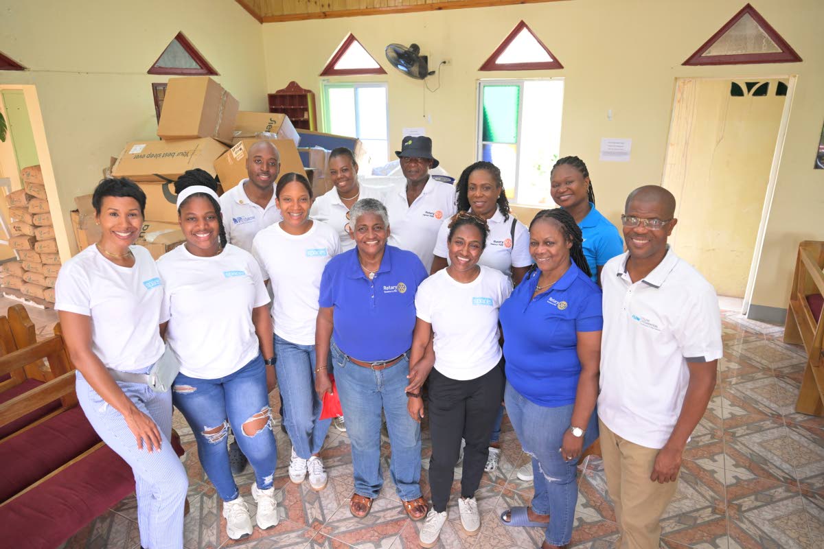 Front row (from left): Toni-Ann Hibbert, marketing officer; Janine Boulevard, administrative assistant; Janelle Pantry-Coke, creative director; Rotarian Jean Powell of Savanna-la-Mar; Tianna James, intern at Spaces; Audrey Williams, member of the Rotary Cl