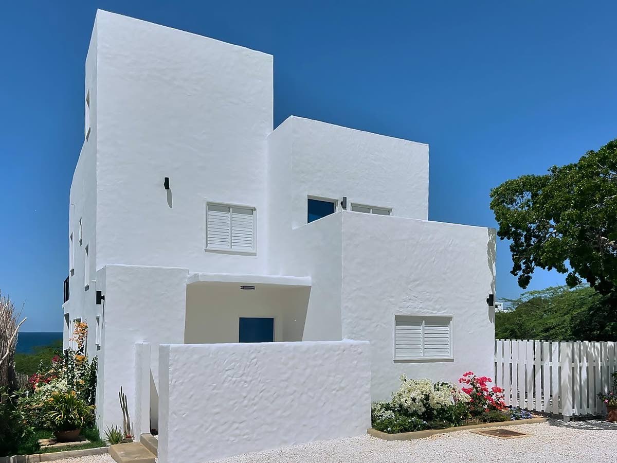 A cubic coastal home inspired by its owners’ trip to Greece.
