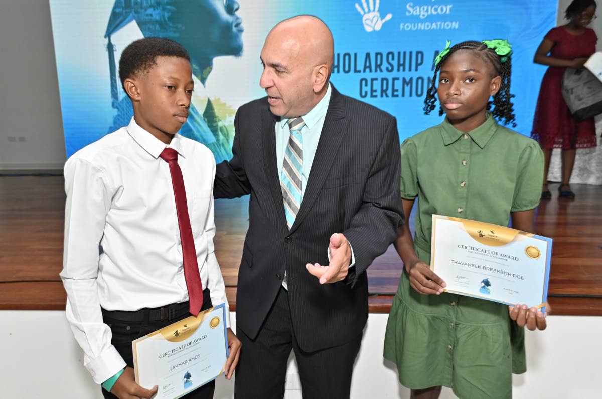 Christopher Zacca, president and CEO of Sagicor Group Jamaica and chairman of Sagicor Foundation, speaks with JTA/Sagicor National Athletics Championships, Jahmar Amos, 2026 Champion Boy and Travaneek Breakenridge, 2026 Championship Girl at the Sagicor Fou