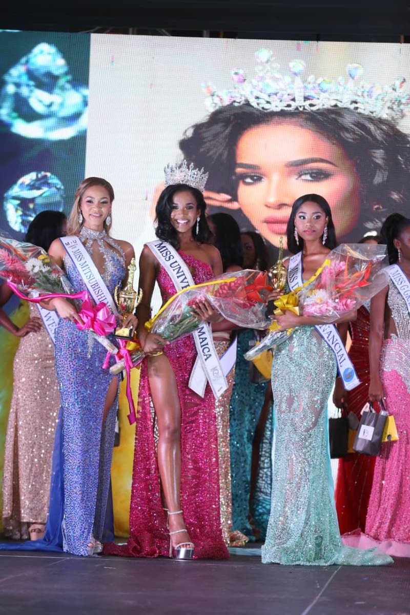 Newly crowned Miss Universe Jamaica 2026 Celene Hall (centre) is flanked by first runner-up Dr Tianna McDaniel (right) and second runner-up Kadejah Anderson following the coronation on Sunday night.