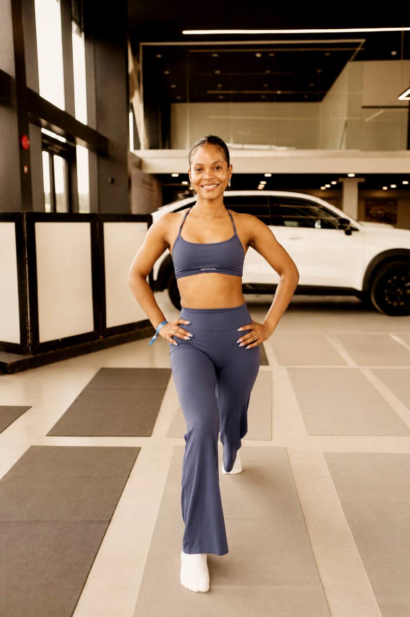 Sky Cammock engages in a lunge during Powerade’s Power in Pilates showcase last Saturday at the GWM Jamaica showroom.