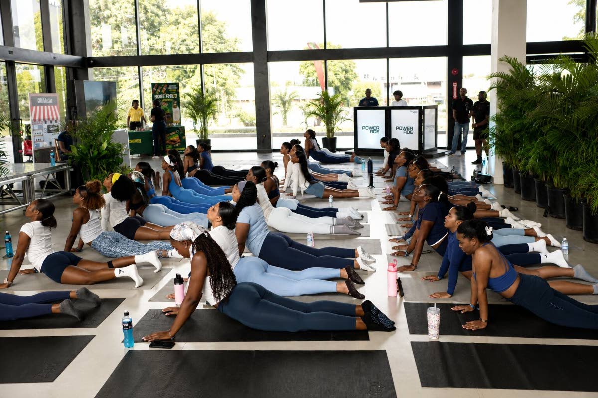 Participants stretch and reset during Powerade’s Power in Pilates showcase, a wellness experience designed to build strength, connection, and lasting energy in a supportive community setting.