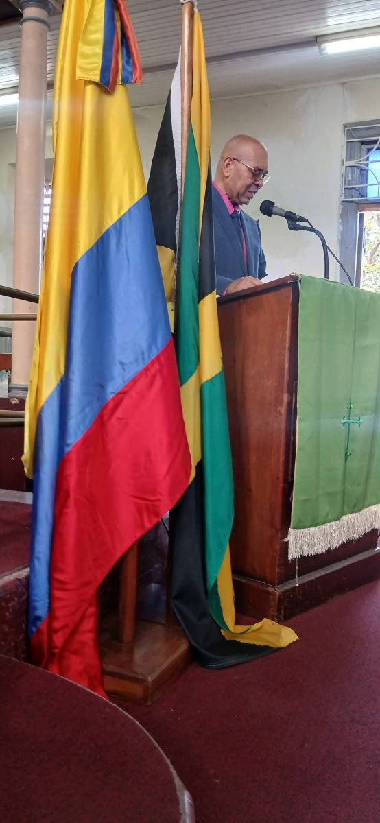  Chairman of the Jamaica National Heritage Trust Oliver Hill delivering Minister of Culture Olivia Grange’s remarks at the service to honour Rev’d Philip Beekman Livingston Jr at the East Queen Street Baptist Church, downtown Kingston on Sunday, August