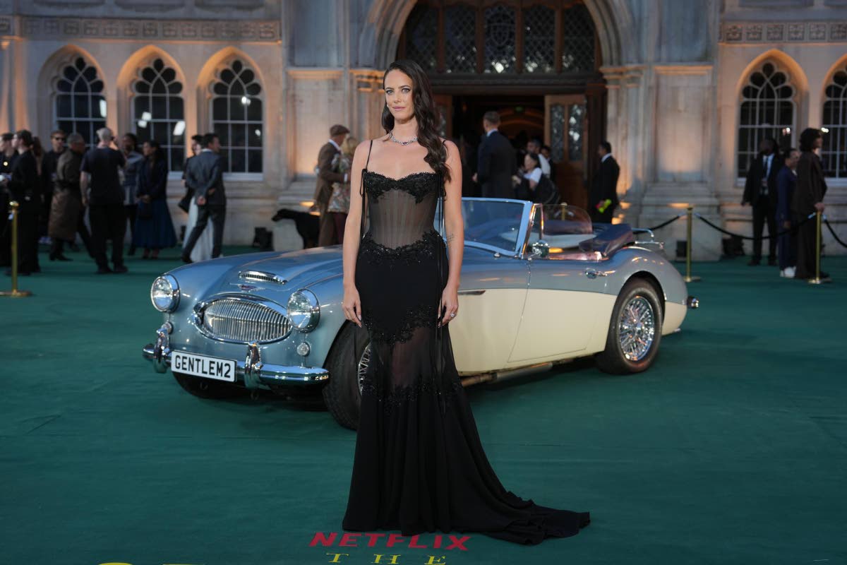 Draped in Paolo Sebastian couture, Kaya Scodelario poses for the camera.