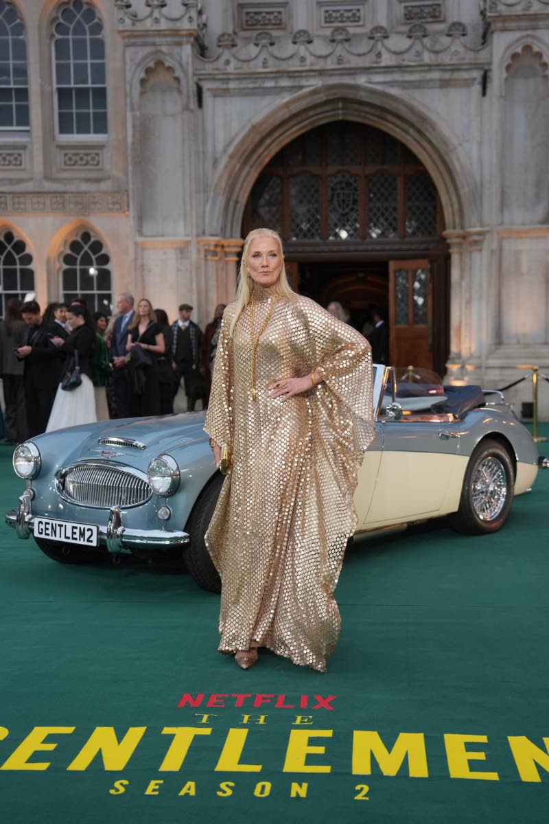 Joely Richardson shimmers in gold on the green carpet.
