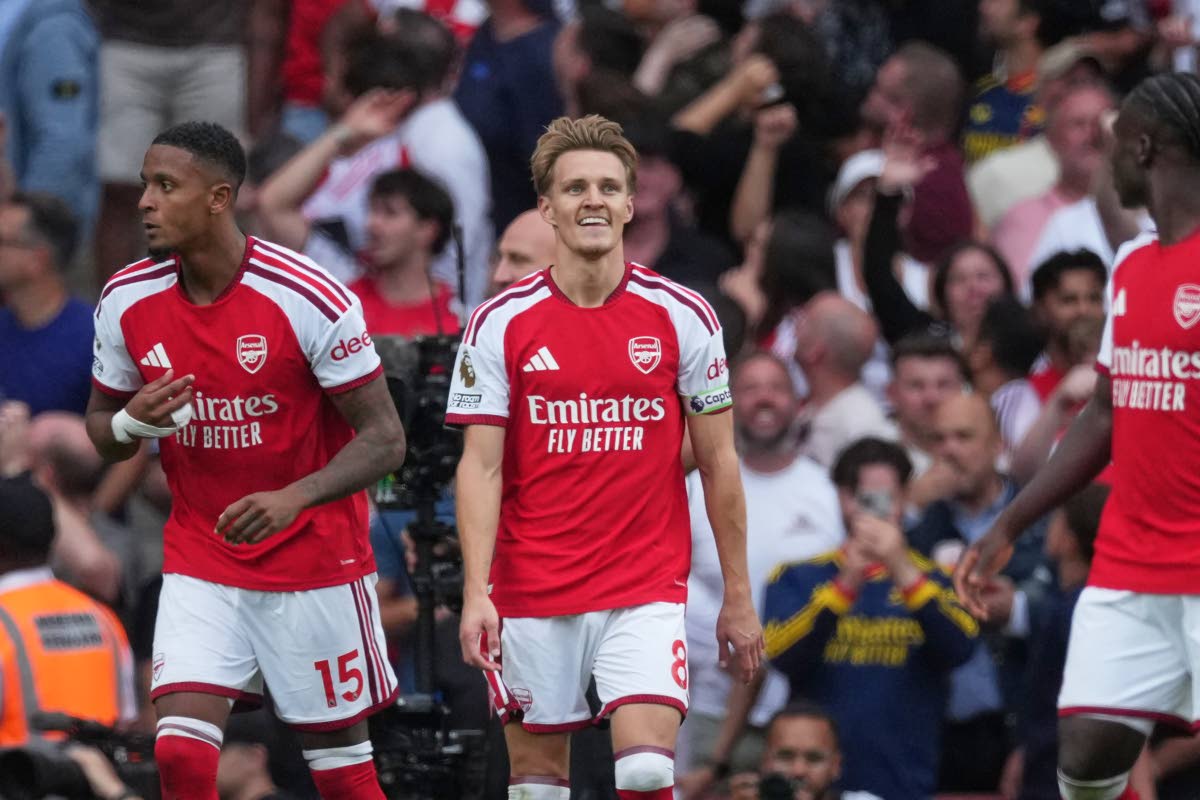 Arsenal's Martin Odegaard, centre, reacts during the English Premier League football match between Arsenal and Chelsea in London, Sunday, September 6, 2026. (AP Photo/Dave Shopland)