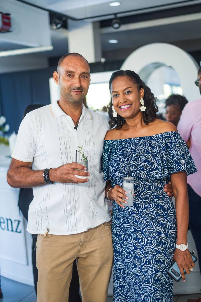 Kevin Wade (left) and Ladianne Wade enjoy a Sunday outing at the Mercedes-Benz showroom during Mirrored Momentum.